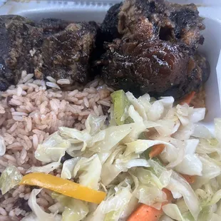 Oxtails includes rice &amp; cabbage