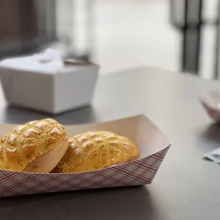 two pastries in a basket