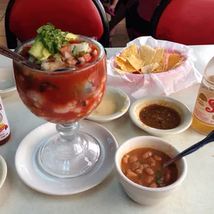 Revive Muertos Shrimp Cocktail: Shrimp, oysters, octopus&amp; ceviche. Complimentary chips, salsa, cheese dip and delicious borracho beans.