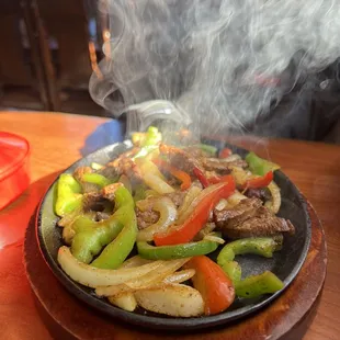 a steaming plate of food