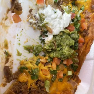 Charred and drowned in grease, this Mexican Pizza is just a sad mess.