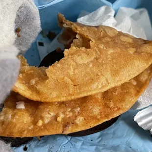 Burnt and fried to hell with grease, this Side Taco was so bad we threw it away.