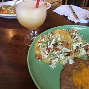 Baja Fish Tacos and a blended peach margarita