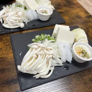 two plates of food on a table