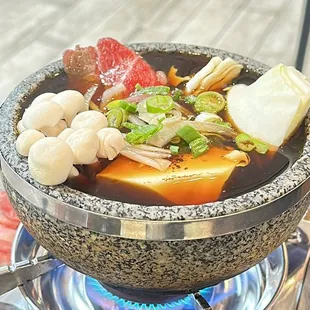 a bowl of soup on a stove