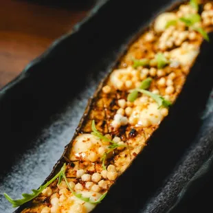 Grilled Eggplant
Sweet Soy Sesame Glaze Smoked Yuzu Mayo