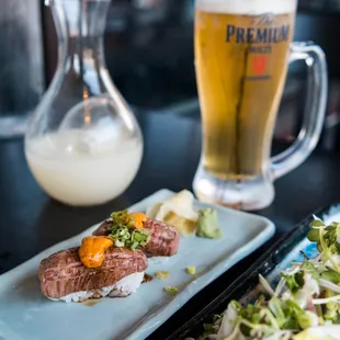 Sake, Suntory Premium Malt, Aburi Wagyu and Uni, and Black Garlic Oil Chu-Toro Tataki