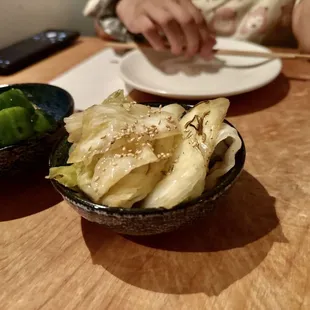 Addictive Cabbage, topped with seaweed and sesame seeds