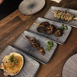 From left to right: Hotategai (scallop on noodles), hatsu (chicken heart), shiitake (mushroom), neganegi (leek)