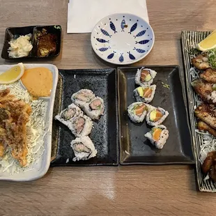 Happy hour Calamari tentacles, negi hama roll (ate some already), salmon avocado roll (ate some already), garlic pork belly