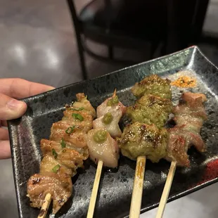 a person holding a plate of food