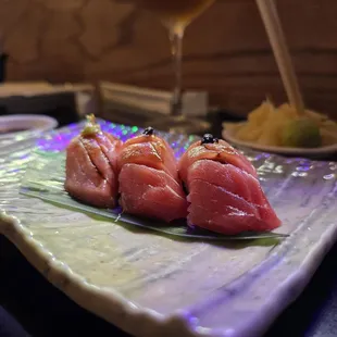 Overpriced sushi with underwhelming service and ambiance.