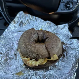 Bacon egg n cheese on a pumpernickel bagel $7 (instagram: @issa.cheatday)