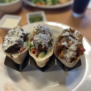 Trio. Steak, falafel and chicken. So good