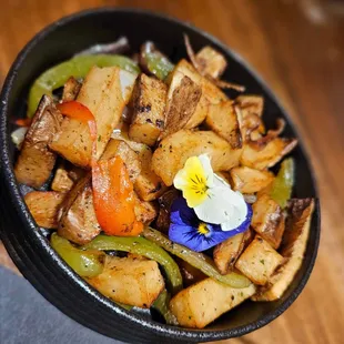a bowl of food with vegetables