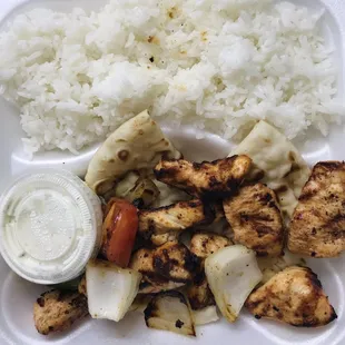 Chicken Kebab w/ rice, onions, tomato &amp; tzatziki sauce dip