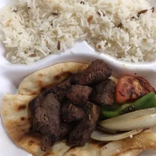 Beef Kebab w/ pita, onions, peppers, and Turkish pilaf rice mixed with orzo.