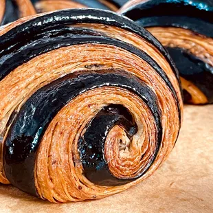 Moroccan Black Olive Chocolate Croissant - Dry cured black Beldi olives play beautifully with Valrhona dark chocolate &amp; a hint of buckwheat.