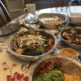 a table full of mexican food