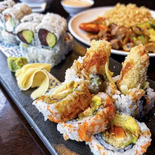 a variety of sushi and rolls