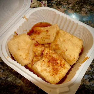 tofu in a styrofoam container
