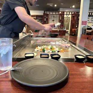 The entire experience was exciting as he cooked for us.  See the sauces.