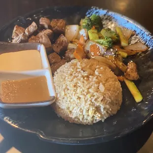 Lunch with fried rice, vegis, and steak