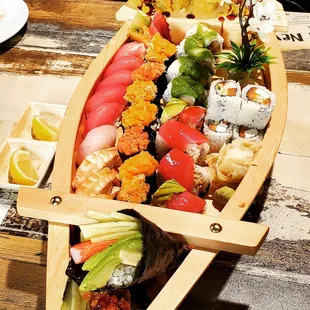 Amazing assortment of sushi.. Owner, May, is a gem. All you can eat menu well worth the price. Be patient and trust their recommendations!