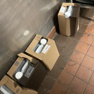 Soy sauce containers soaked in dirty water.