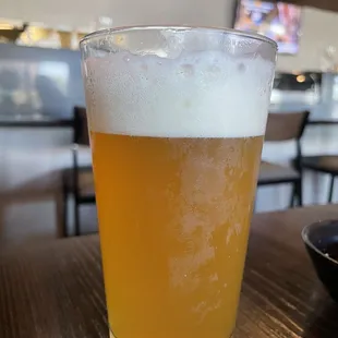 Served with almost a third of the glass full foam, and a straight face.