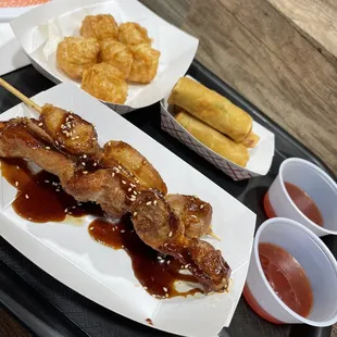 Shrimp Shumai, vegetable spring rolls, chicken yakitori