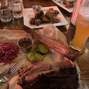 a plate of ribs and sides