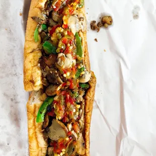 Cheesesteak Hoagie with grilled onions, green peppers and crushed hot peppers - $10