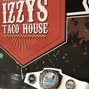 a belt with a badge on it