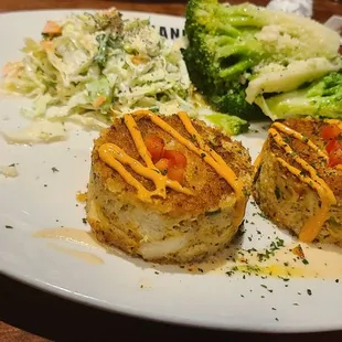 Crab cakes and coleslaw Broccoli was substituted instead of fries