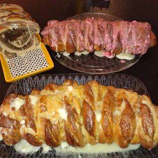 a loaf of bread with bacon and cheese