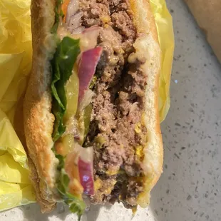 This is my son's double double cheeseburger after he destroyed most of it.