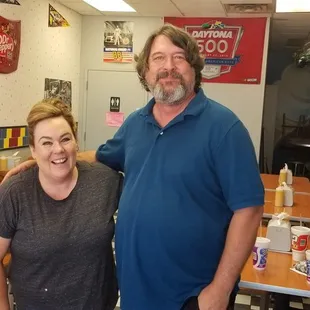 My husband Tom with the owner