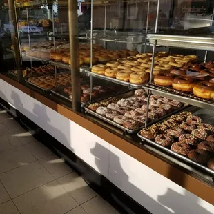 a display case full of doughnuts