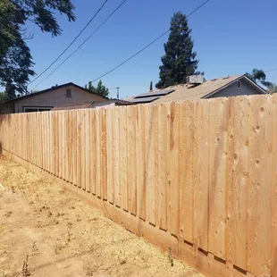 6ft high cedar fence with pickets to cover the gaps