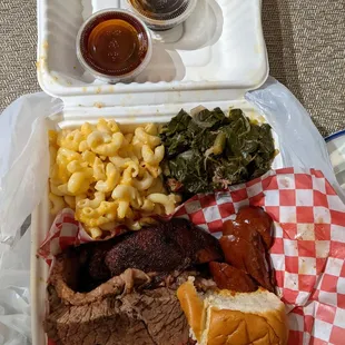 three meat plate with ribs, brisket, and hot link