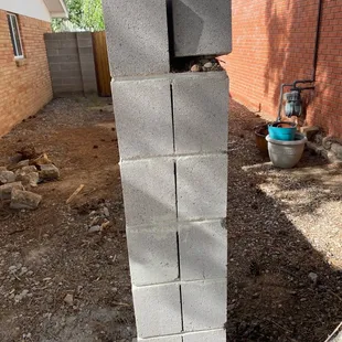 Loose cinder block, not sure if there's rebar anywhere in there.