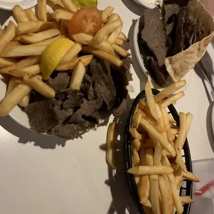 Gyro dinner &amp; a gyro sandwich both with fries.