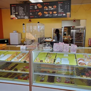 a woman behind the counter