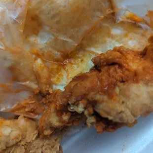 It looked as though something took a small bite of this piece of chicken.