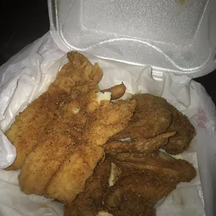 Flounder &amp; Chicken Wings, drowned in powdered Seasoning AFTER it was prepared.