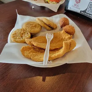 Catfish fried green tomatoes and hushpuppies