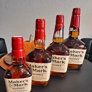 four bottles of maker&apos;s mark