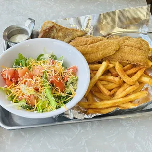 Catfish platter with fries and salad.