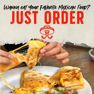 a person eating a quesadilla